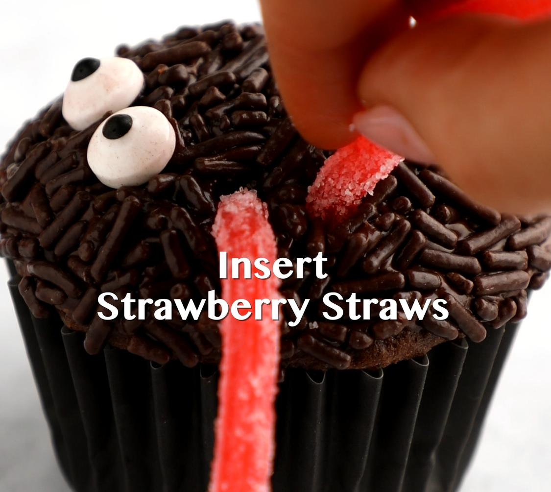 Insert the candy straw legs