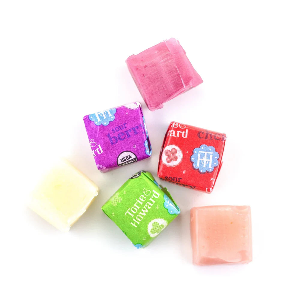 Chewie Fruities sour candy fruit chews wrapped and unwrapped