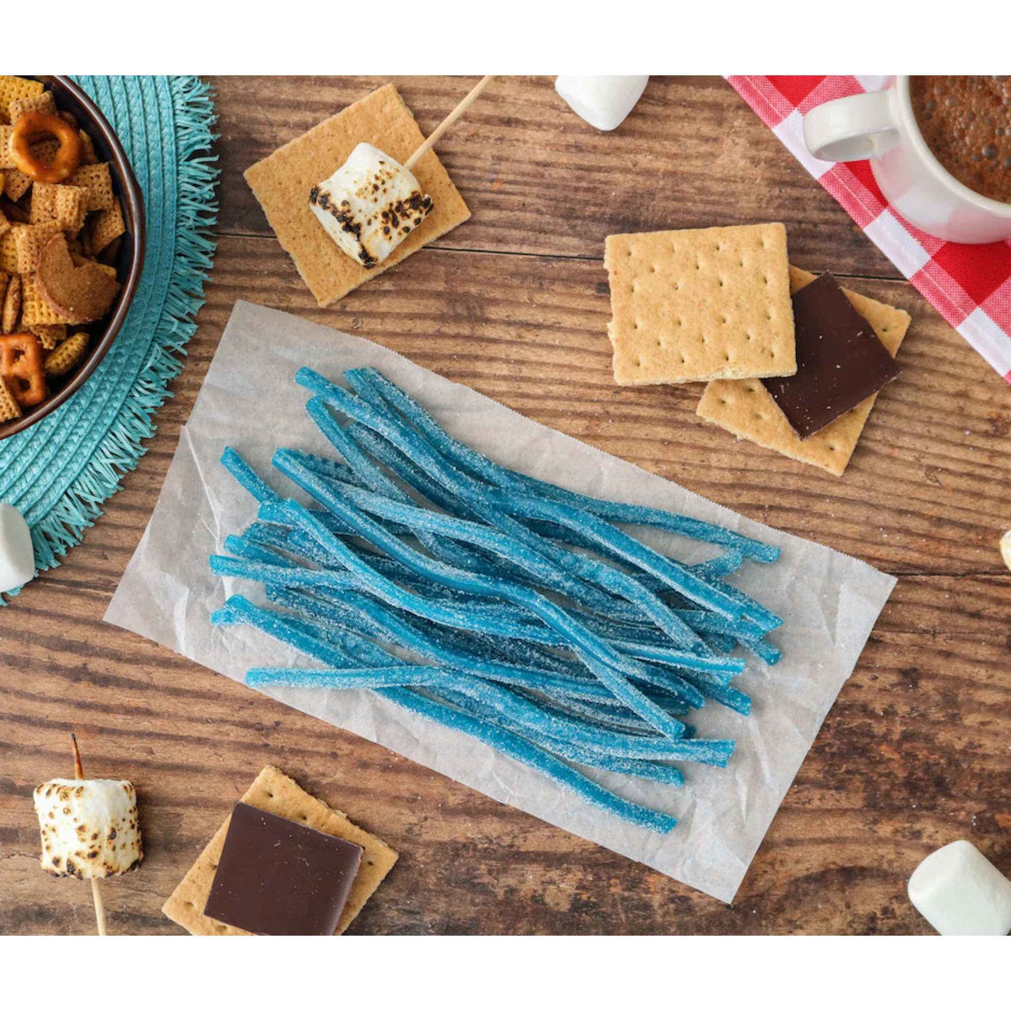 Sour Punch Blue Raspberry Straws Candy alongside s'mores supplies