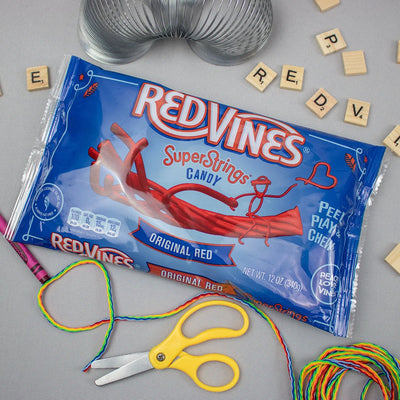 Bag of Red Vines SuperStrings with scrabble pieces and other toys