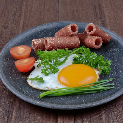 Eggs, veggies, and maple bacon Sour Punch bites on a plate