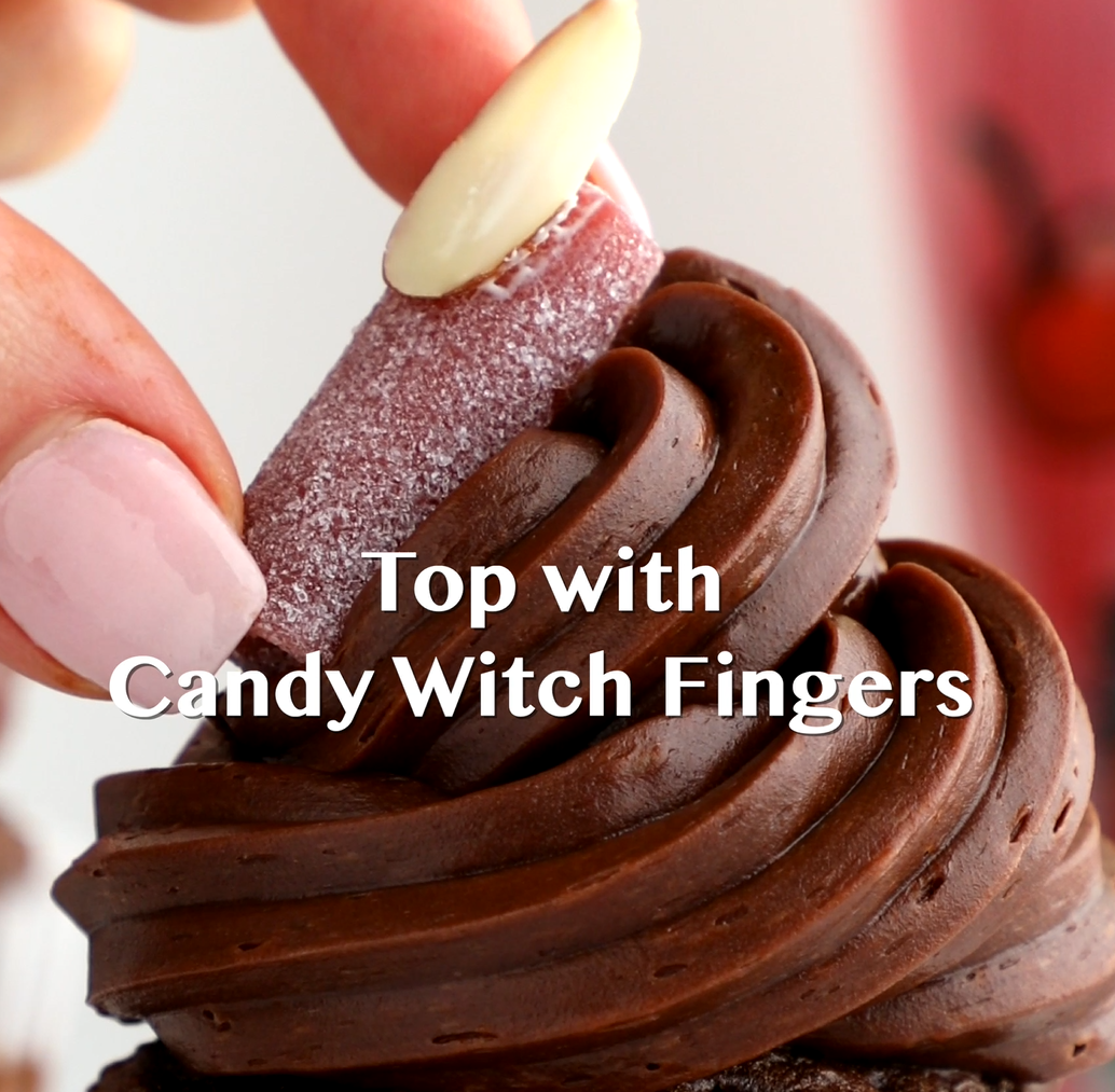 Frost your cupcakes and place the witch fingers