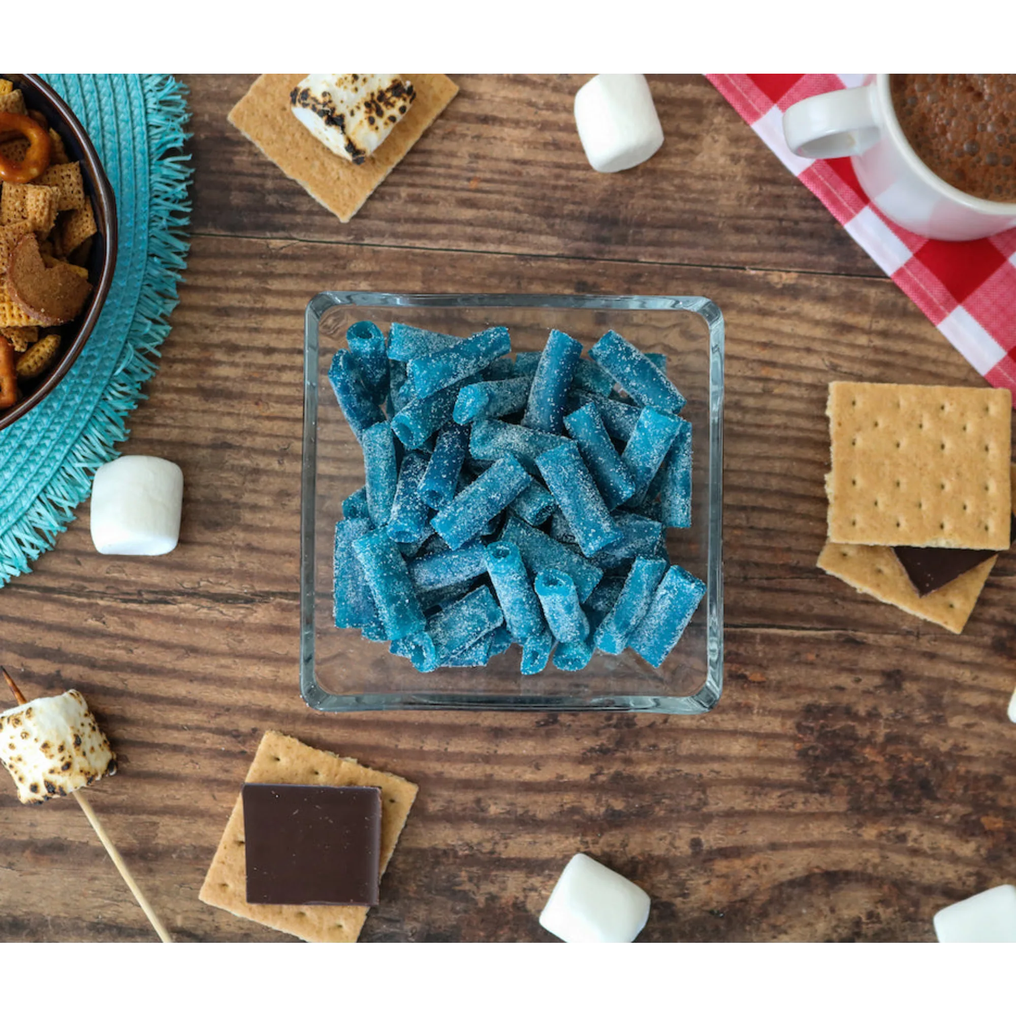 Sour Punch Bites Blue Raspberry Candy alongside s'mores supplies