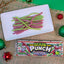 Sour Punch Santa Straws on a holiday plate