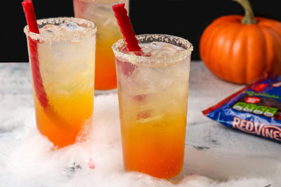 Candy Corn Mocktails with a Red Vines Licorice Candy Straw