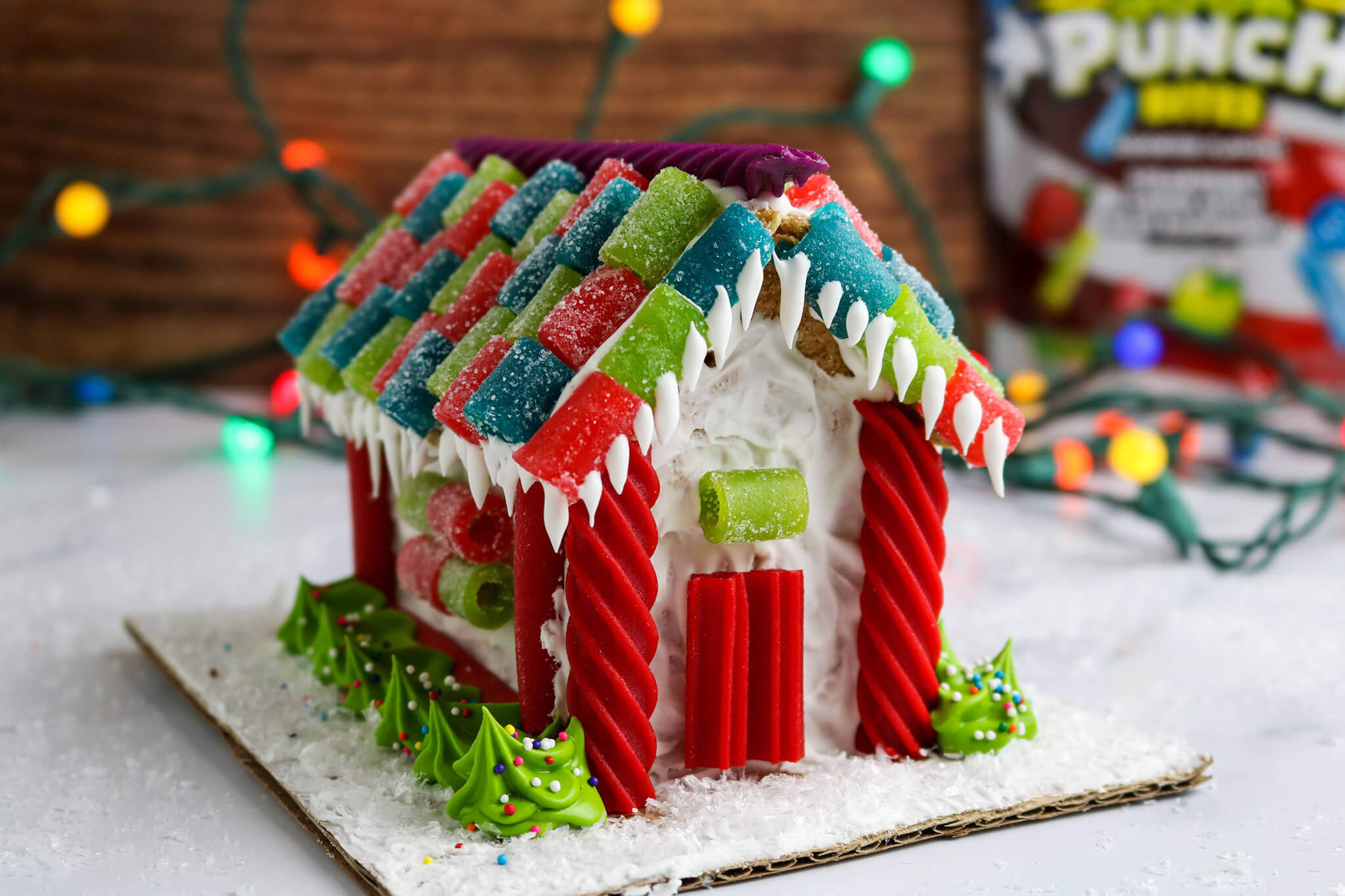 Graham Cracker Gingerbread House made with Red Vines and Sour Punch Candy