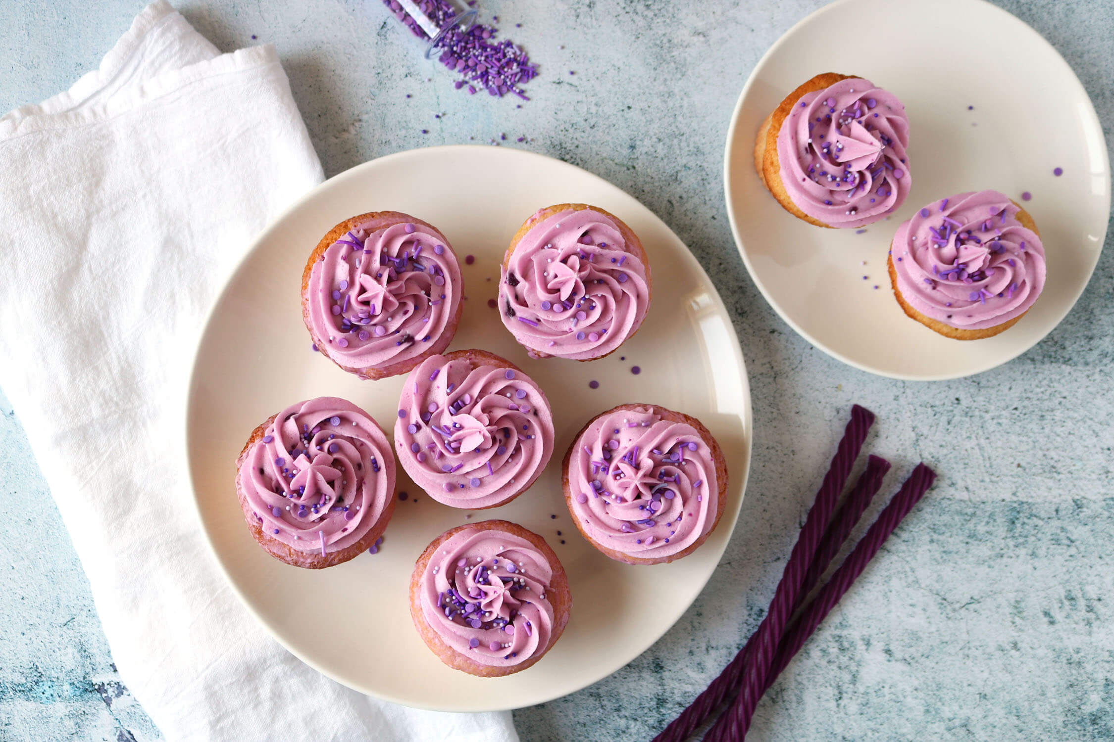 Vanilla cupcakes with Red Vines Grape Licorice flavored buttercream frosting