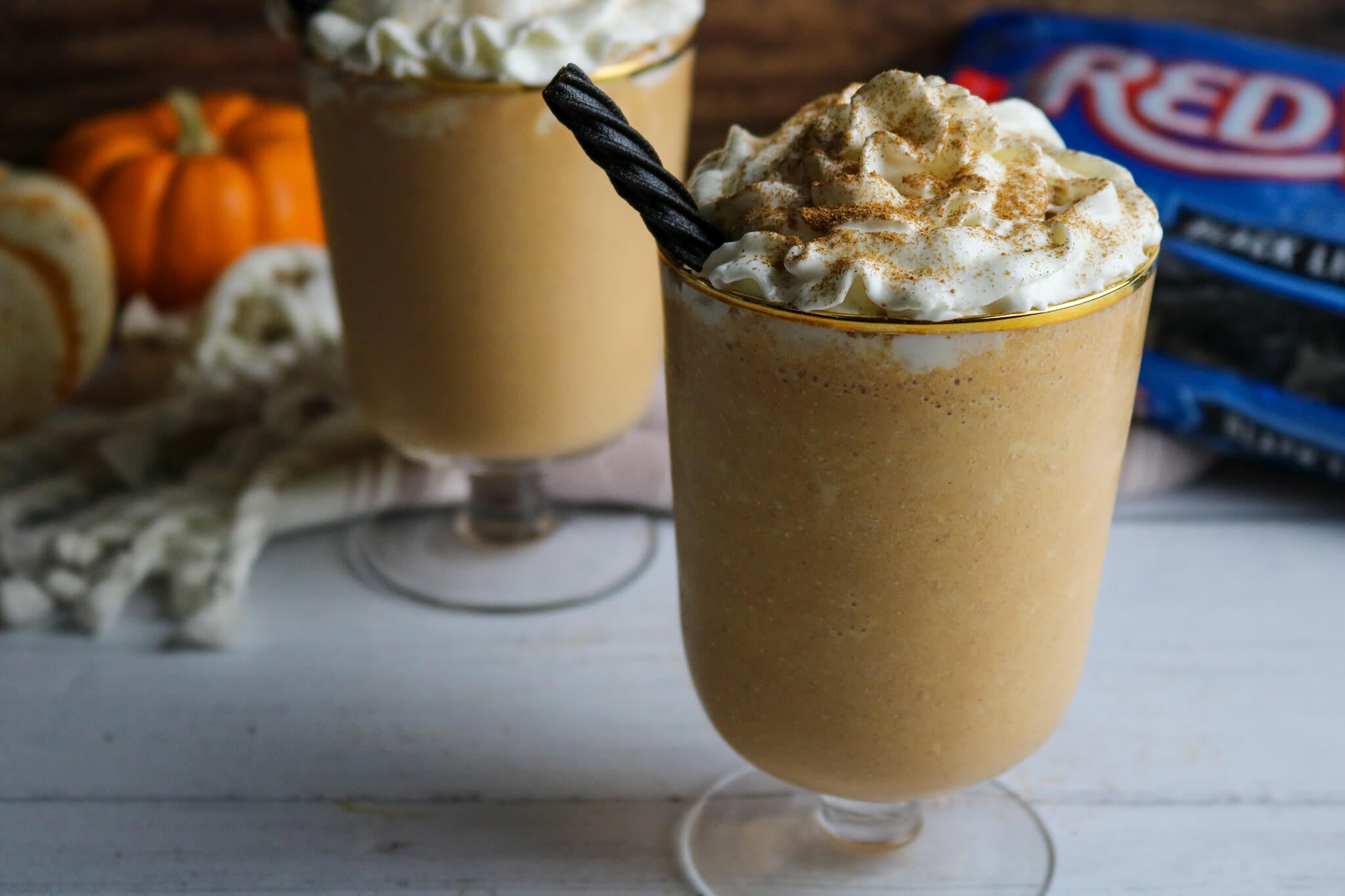 Pumpkin Spice Milkshake Recipe with Black Licorice Candy Straw