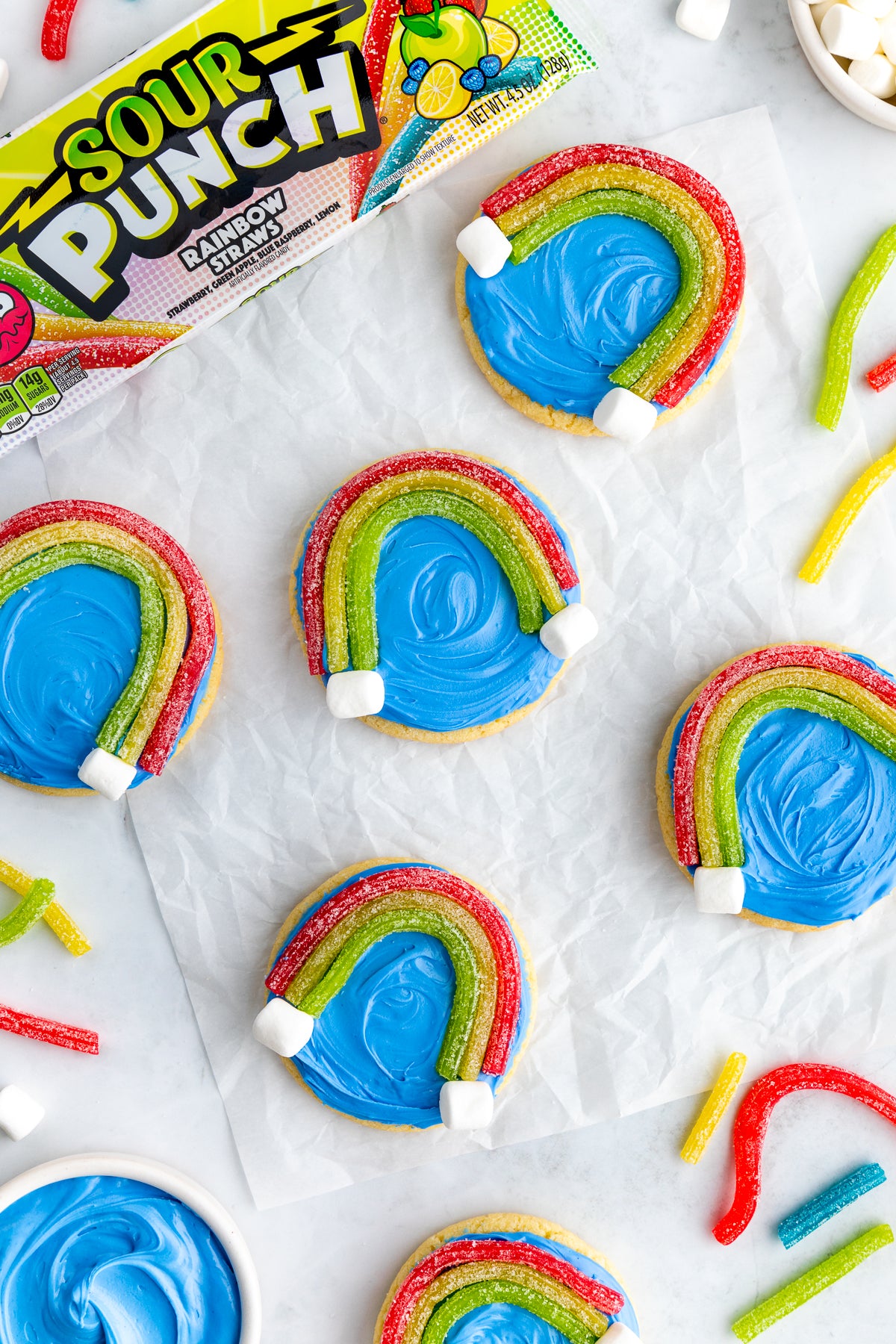 Sour Punch Rainbow Cookies alongside tray of Sour Punch Rainbow Straws candy