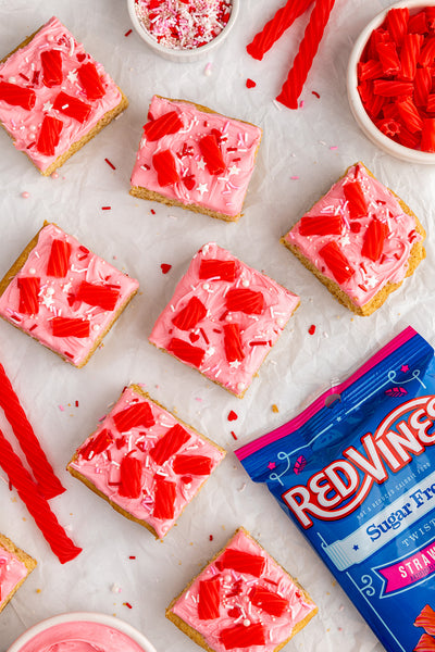 Strawberry Sugar Cookie Bars with Red Vines on top