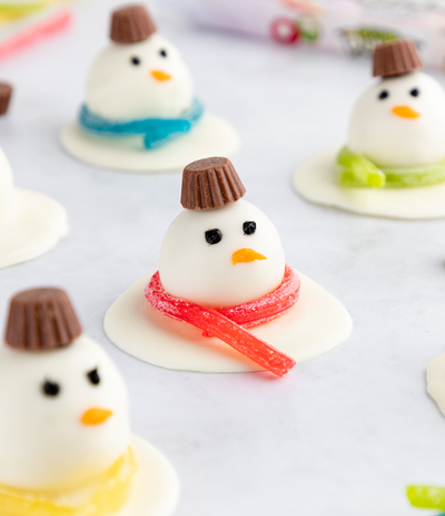 Snowman Truffles Holiday Dessert Recipe with Sour Punch Rainbow Straws