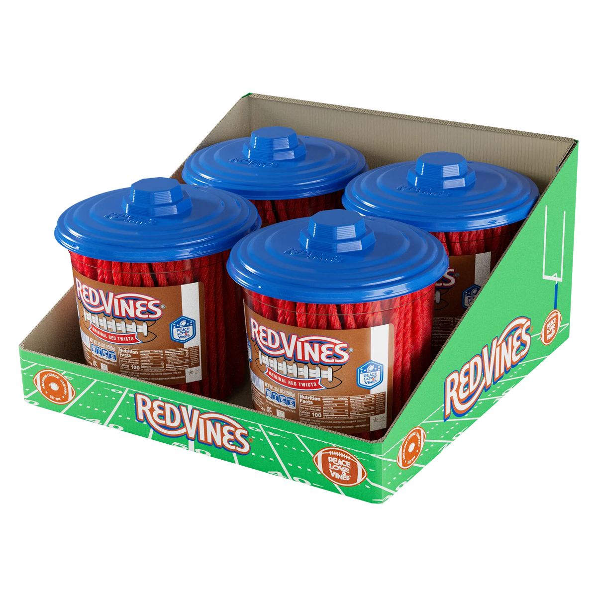 A cardboard football themed display box holding four Red Vines Original Red Licorice jars with blue caps.