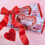 RED VINES Cinnamon Spice Twists 4oz trays with a red bow and a cut-out heart that says "happy valentine's day"