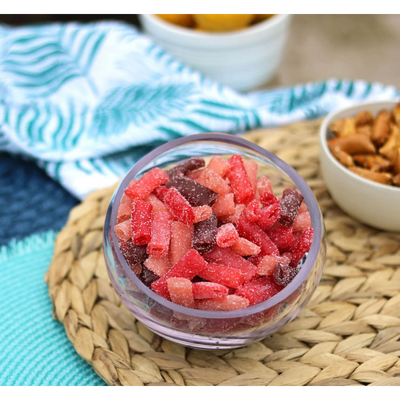 Sour Punch Bites Rad Reds Candy in a bowl near other poolside snacks