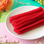 Red Vines Sugar Free Strawberry Licorice Twists  in a pastel colored spring scene