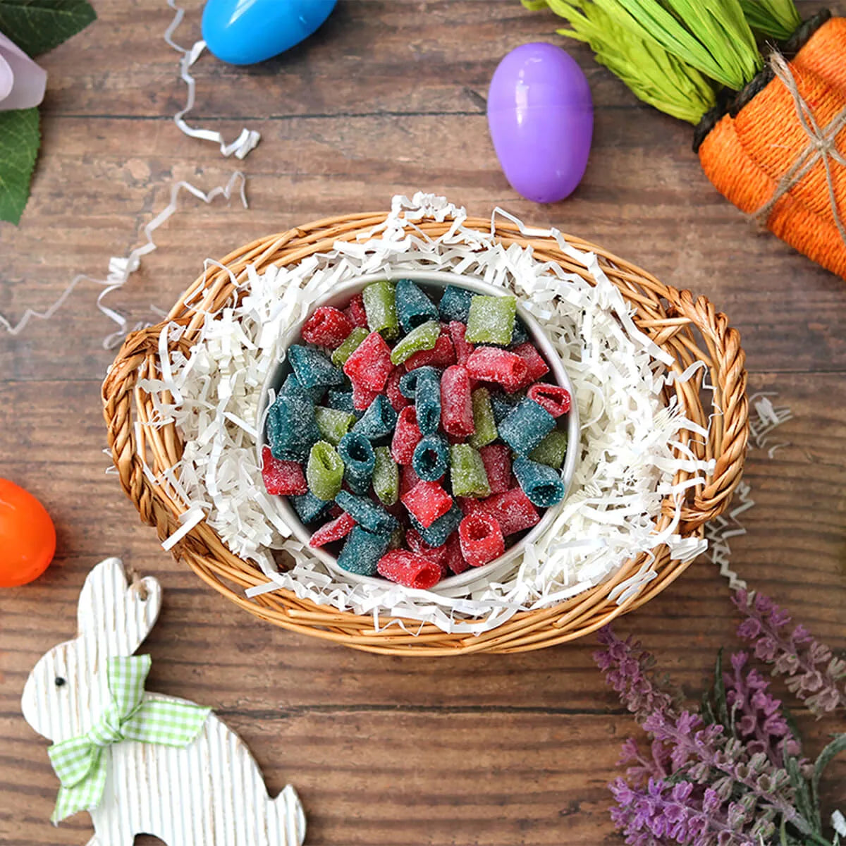 Basket of Sour Punch Assorted Mini candy with plastic Easter eggs