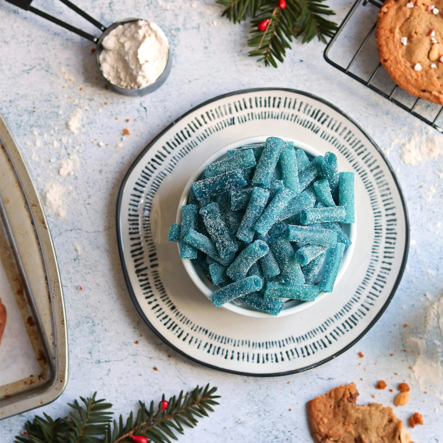 Blue Raspberry Sour Candy Bites with holiday cookies