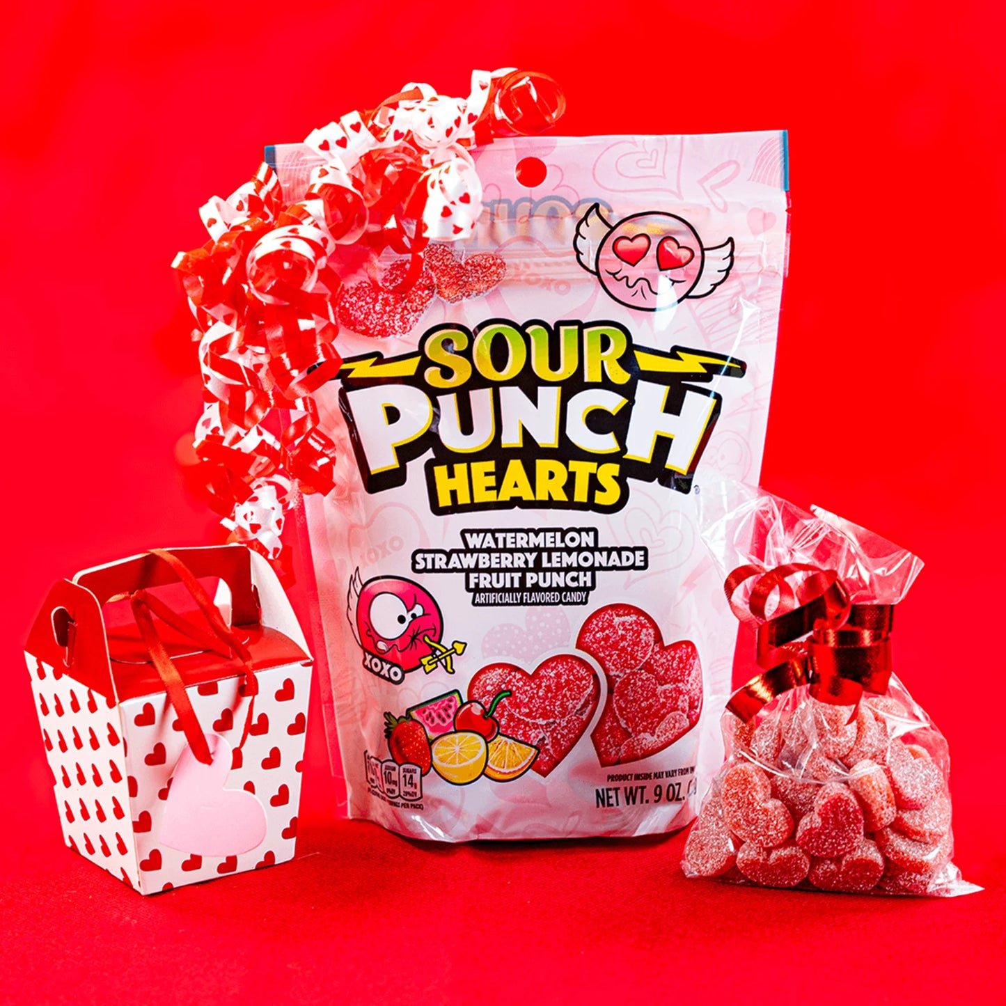 Sour Punch Hearts Valentine's Day Candy bag with a bow, Valentine's gift box and a gift bag of sour candy hearts