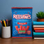 Red Vines Jumbo Twists bag on a desk next to pens and books