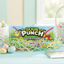Sour Punch Easter Candy Straws with colorful confetti and a white Easter basket on each side