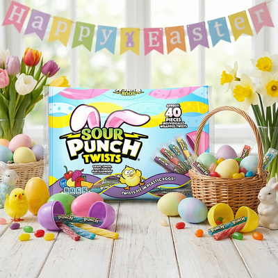 Sour Punch Individually Wrapped Easter Candy surrounded by Easter eggs, tulips and daffodils, and a "Happy Easter" banner