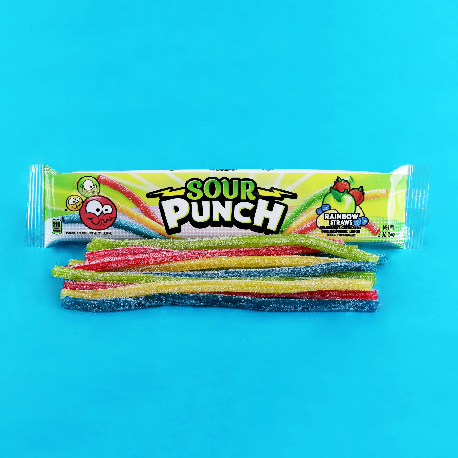 Sour Punch Rainbow Candy Straws 2oz Tray on light blue background with candy straws in front of tray