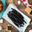 Red Vines Black Licorice Candy Twists alongside s'mores supplies
