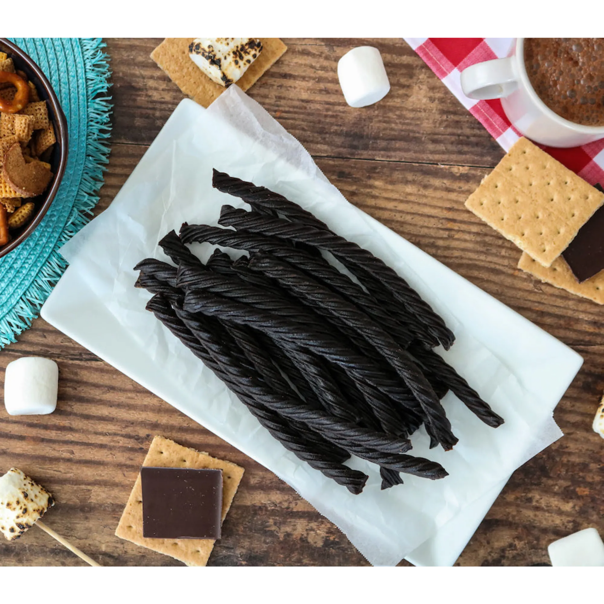 Red Vines Black Licorice Candy Twists alongside s'mores supplies