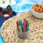 Sour Punch Twists, 3" Individually Wrapped Candy, Assorted Flavors, in a jar near other poolside snacks
