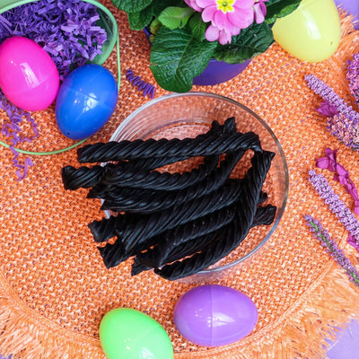 Red Vines Jumbo Black Licorice Twists surrounded by plastic Easter eggs