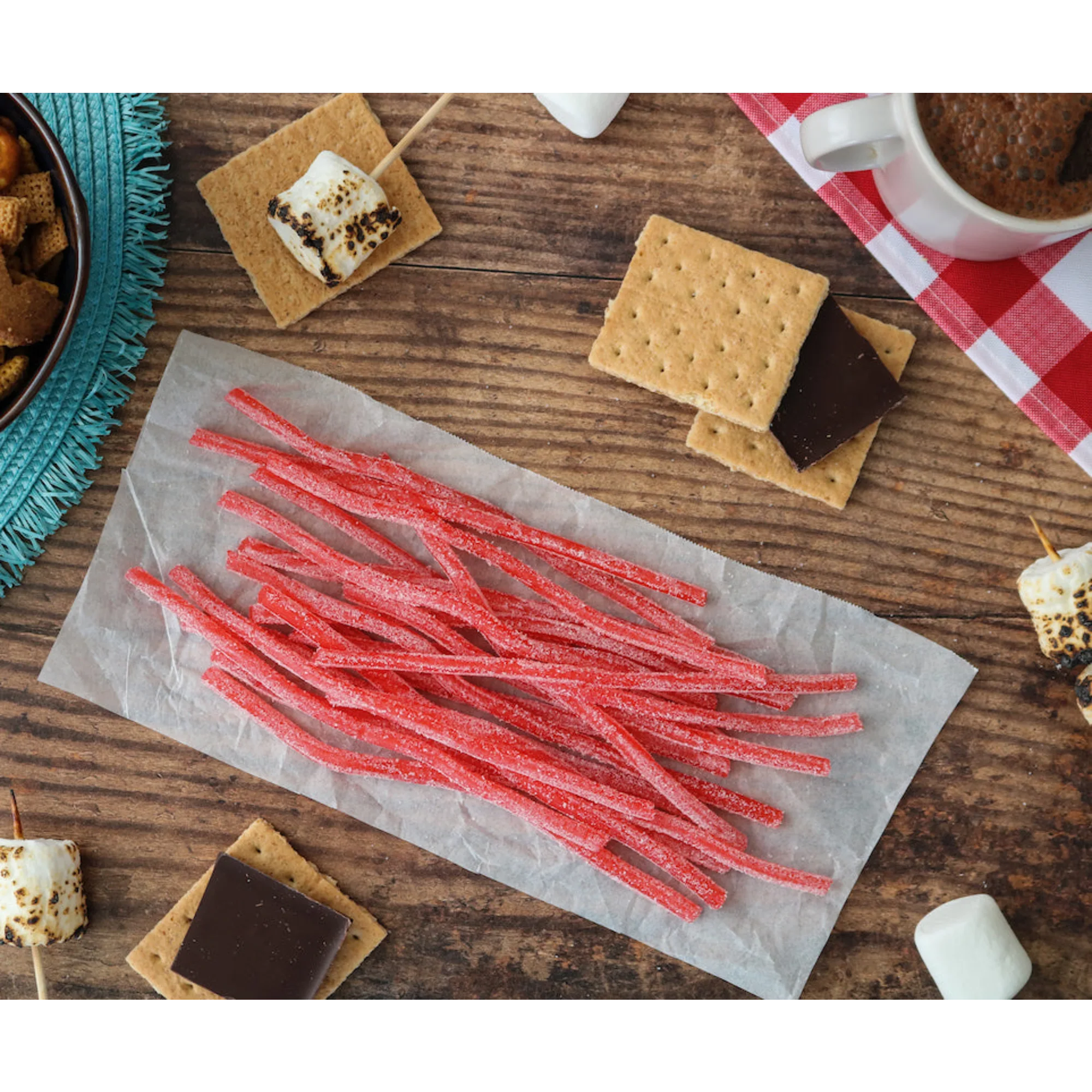Sour Punch Strawberry Straws Candy alongside s'mores supplies