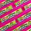 Sour Punch Rainbow Candy Straws 2oz Trays arranged diagonally on hot pink background
