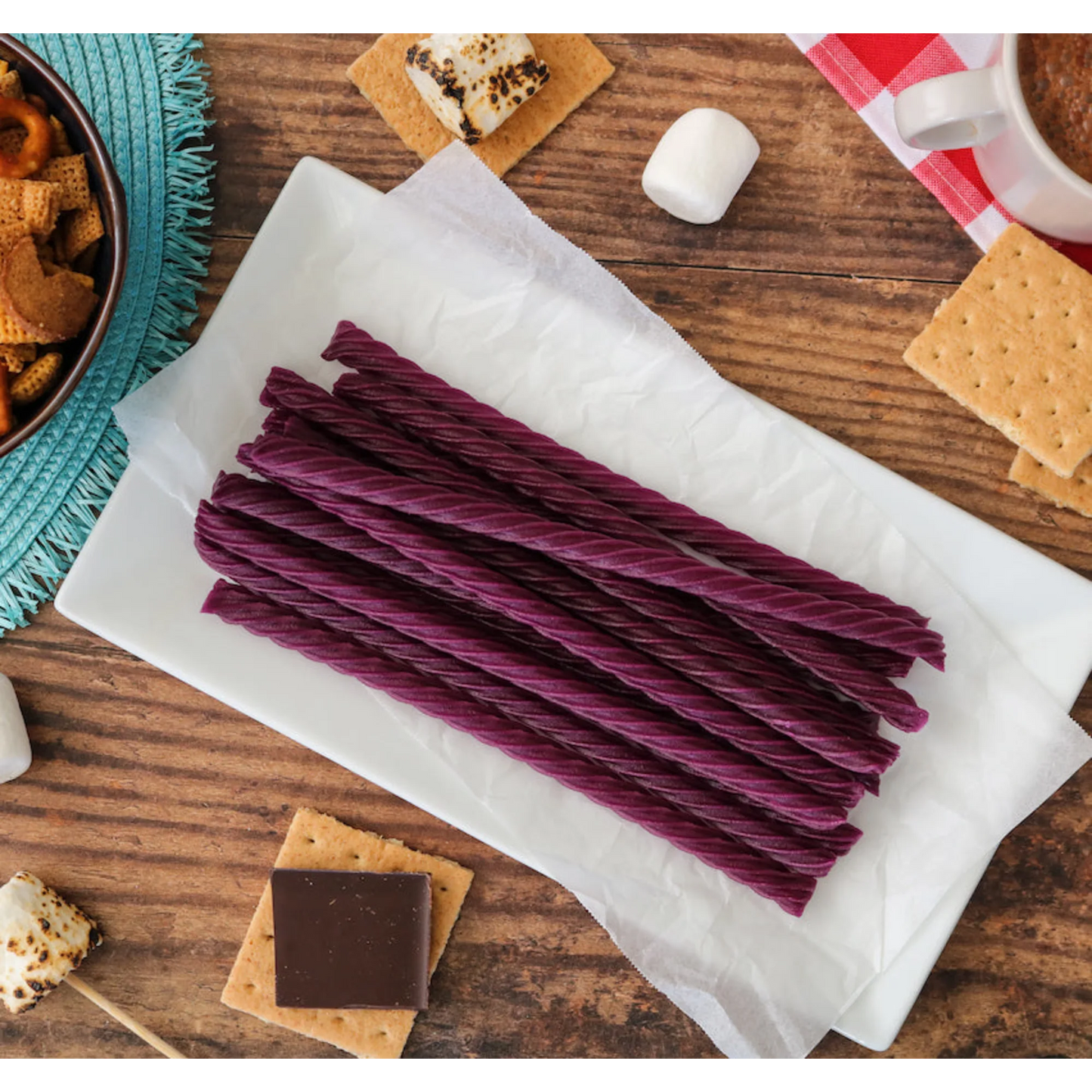 Red Vines Grape Licorice Twists alongside s'mores supplies