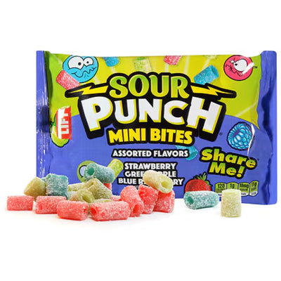 Red, green, and blue candy infront of a Sour Punch Mini Bites Pouch