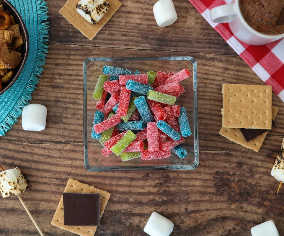 Sour Punch Bites Assorted Flavors alongside s'mores supplies