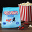 Red Vines Classic Mix Minis 12oz Bag with mixed licorice pieces in front of bag and a bucket of popcorn nearby