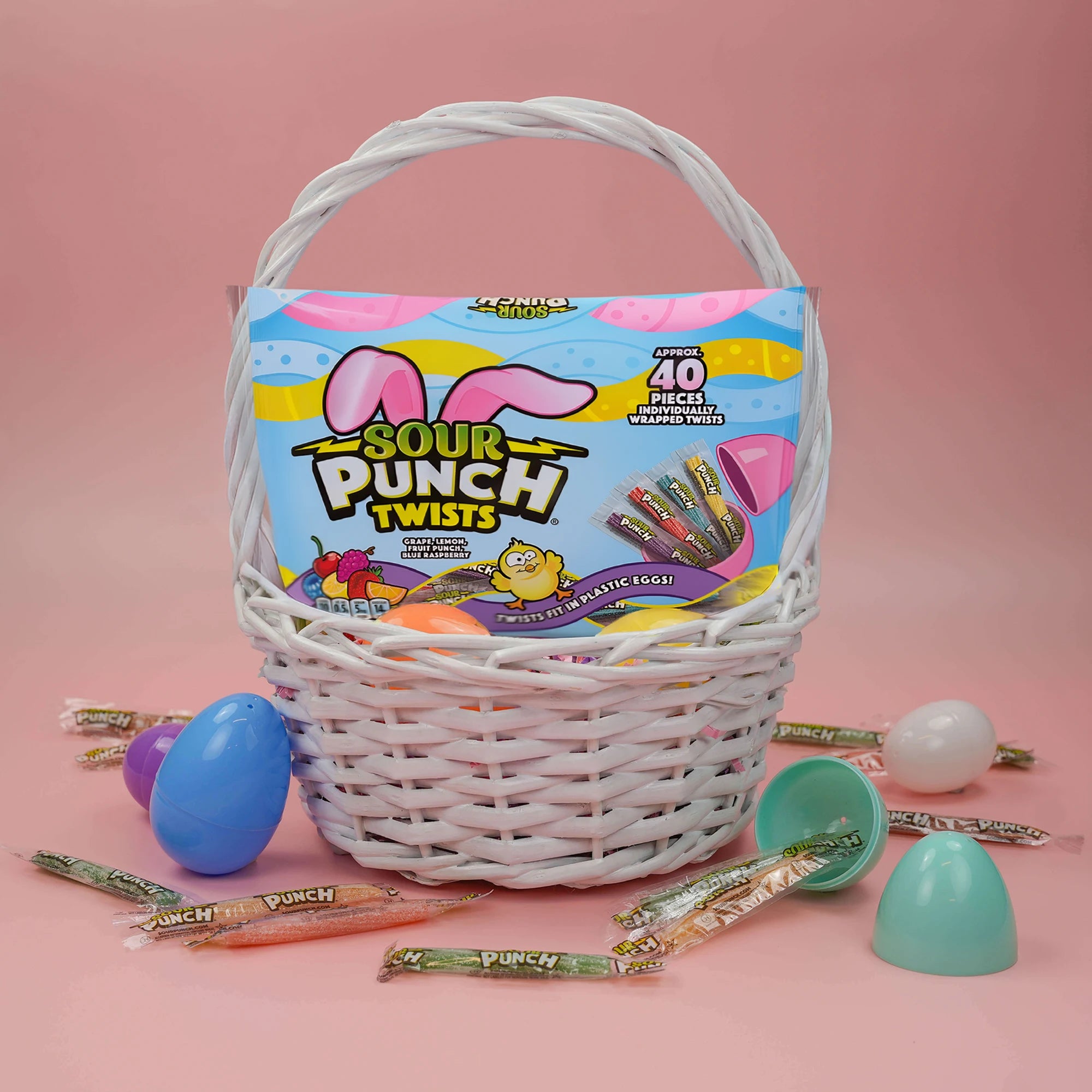 SOUR PUNCH Individually Wrapped Easter Candy in a white Easter basket with plastic eggs