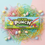 Sour Punch Easter Straws on a pile of colorful confetti, surrounded by pastel dyed Easter eggs