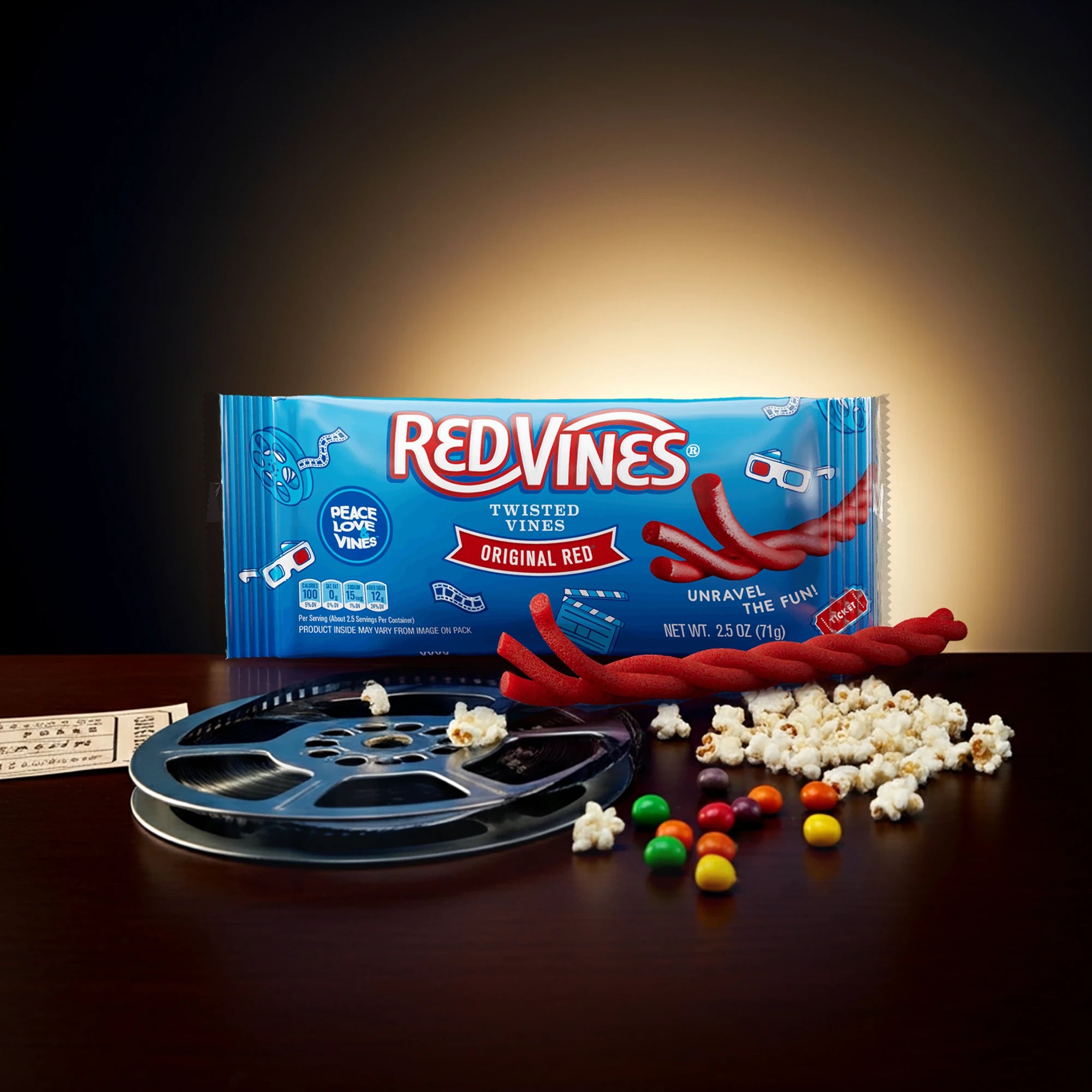 Red Vines Original Red Twisted Vines 2.5oz Bag with snacks and a film reel 
