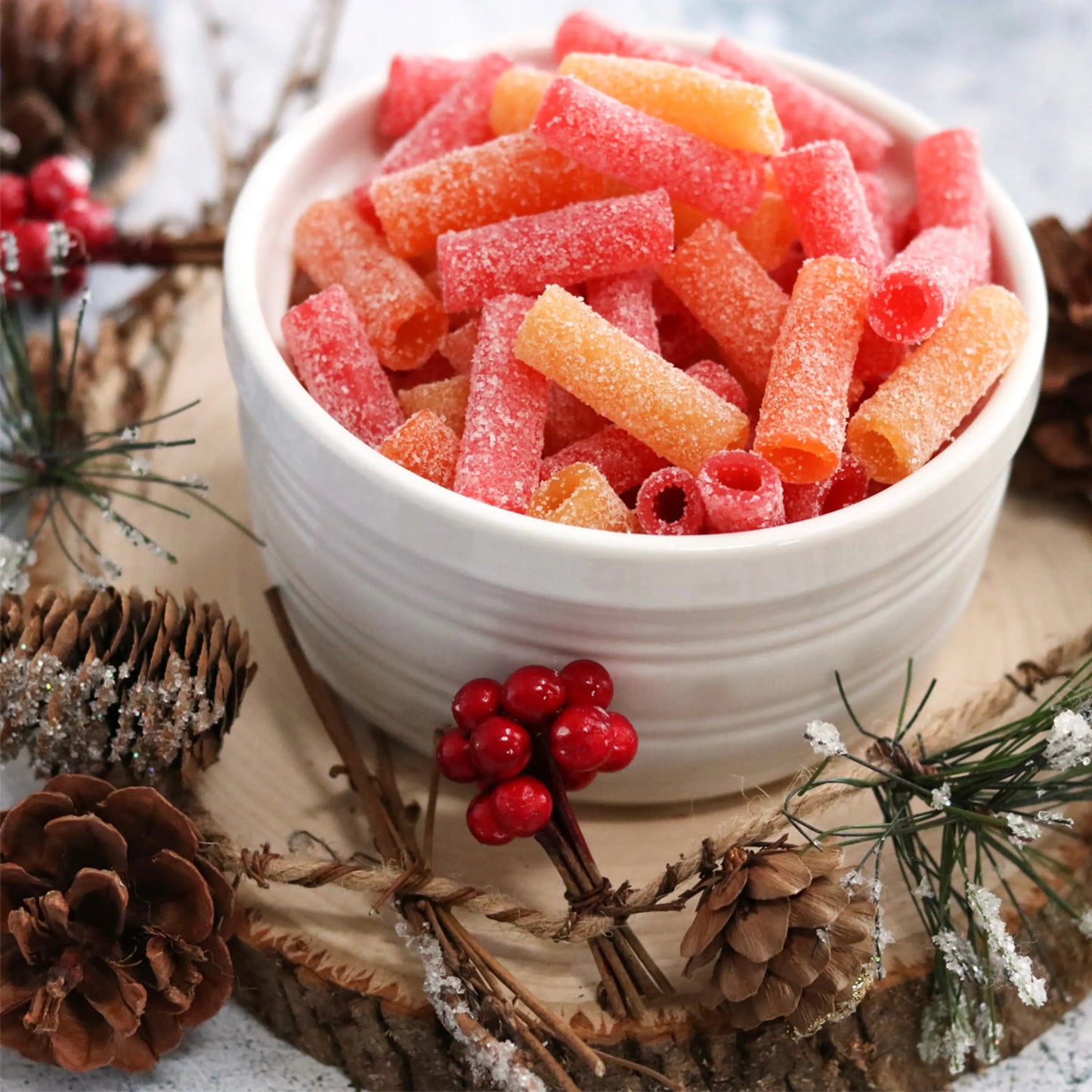 Sour tropical candy bites in a festive bowl