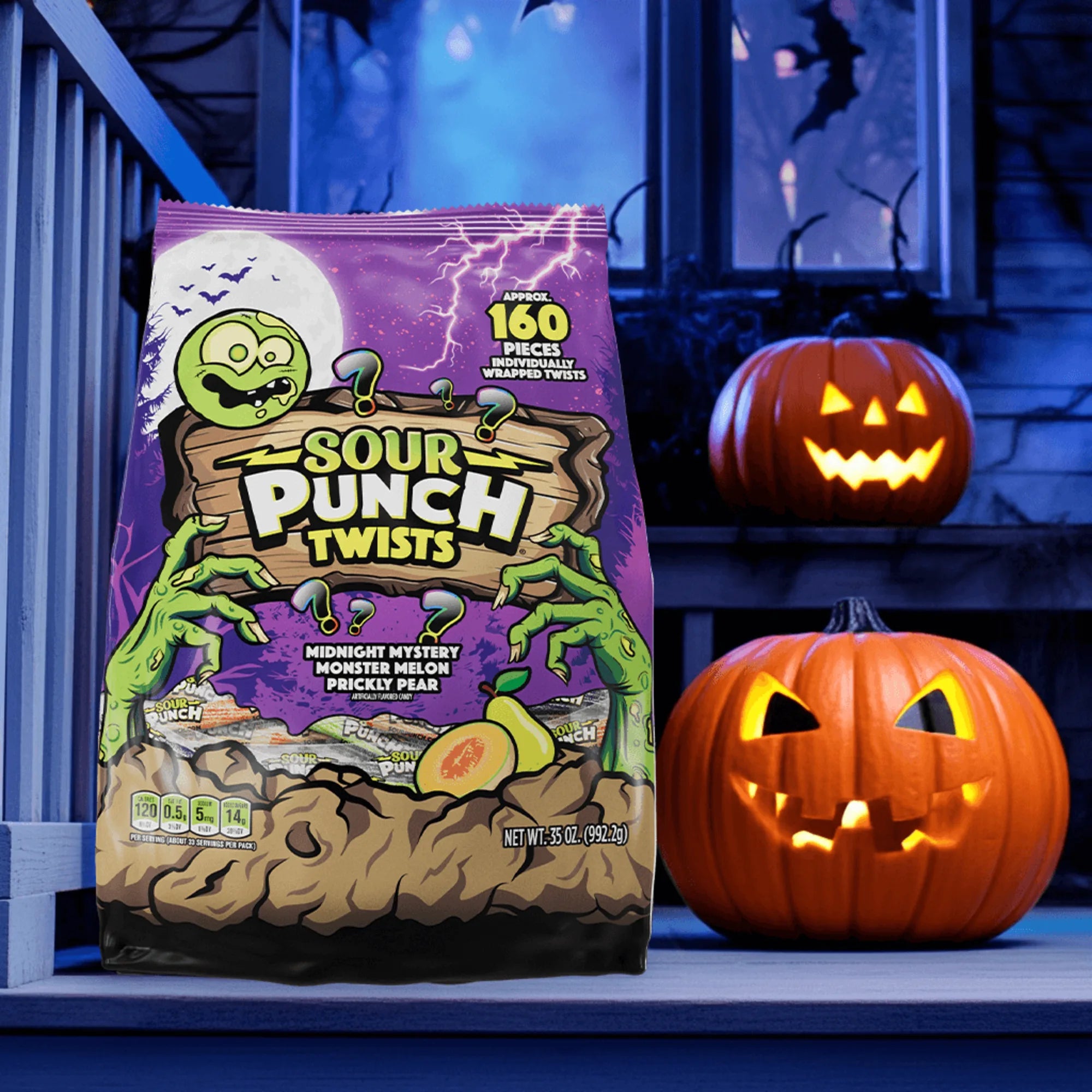Sour Punch individually wrapped Halloween Twists on a porch pumpkins