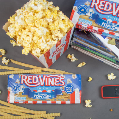RED VINES Buttered Popcorn Twists Popcorn Candy Tray with movie night supplies