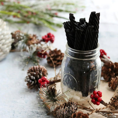 RED VINES Black Licorice Twists in a mason jar on a holiday platter