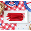 Red Vines Red Ropes Licorice Candy on a picnic table with patriotic decorations