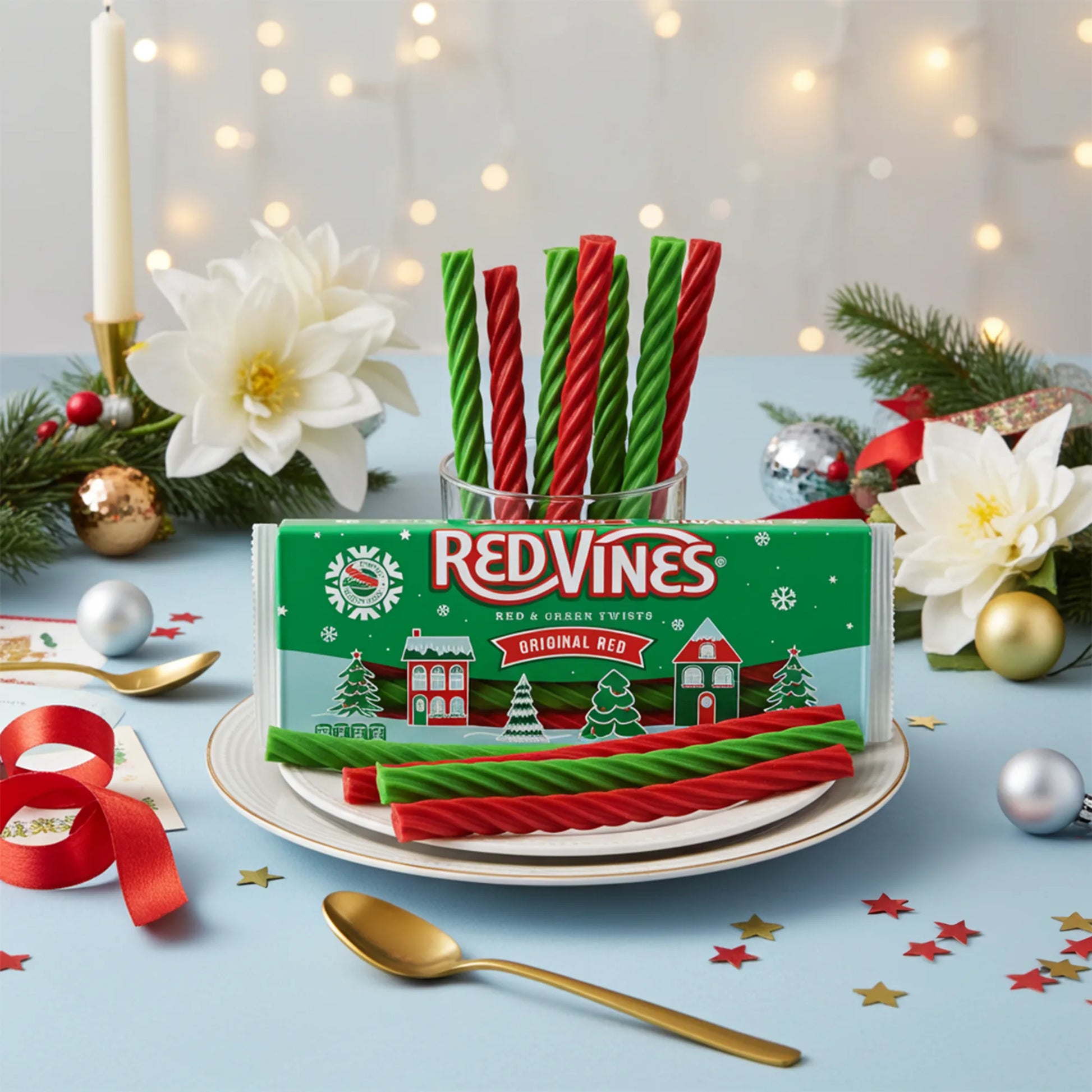 Red Vines red and green candy on a plate with Christmas decorations in the background