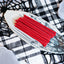 Red Vines Original Red Licorice Candy on a platter with a fake spiderweb and tombstone