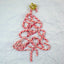 Torie & Howard Organic Mini Candy Canes in the shape of a Christmas tree