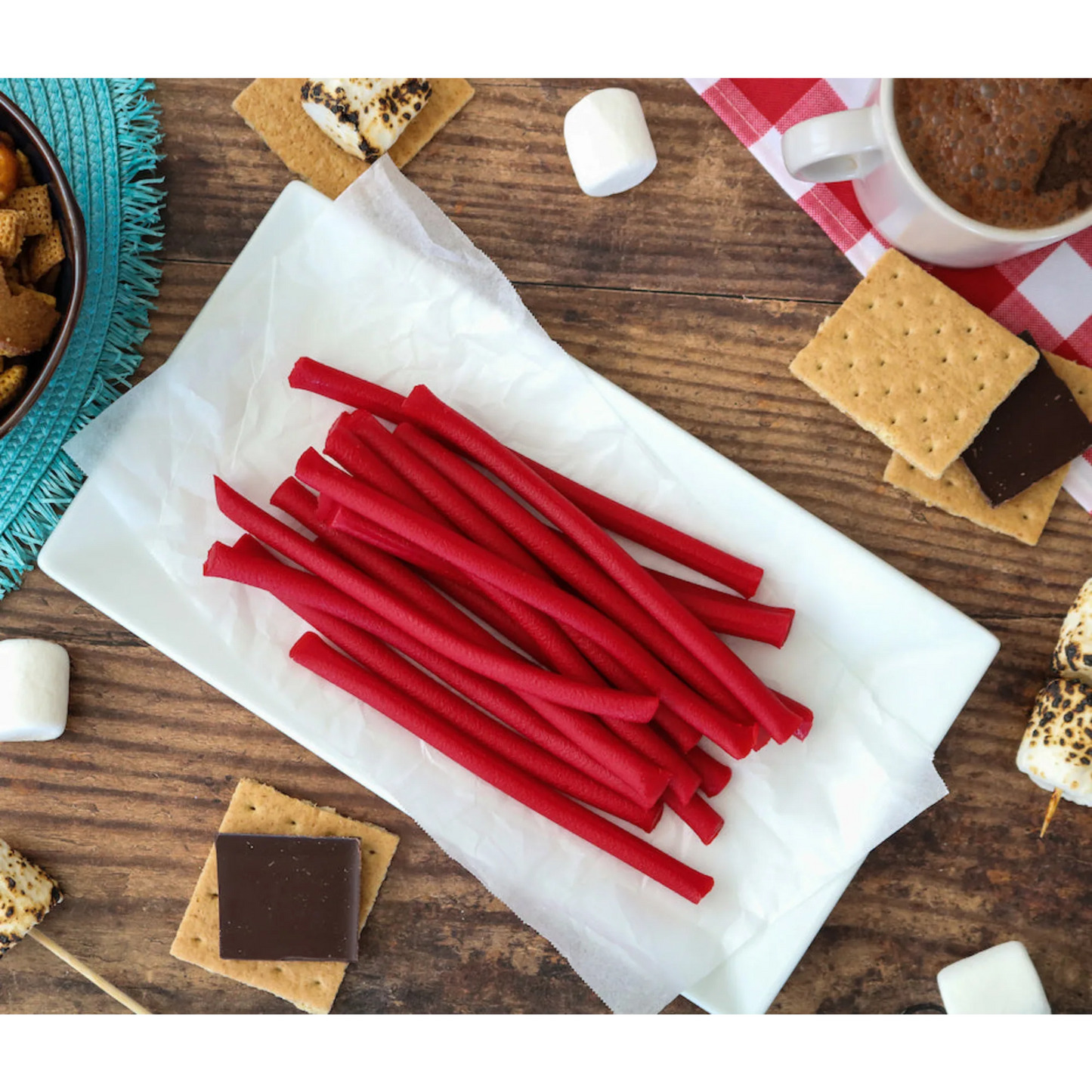 Red Vines Red Ropes Licorice Candy alongside s'mores supplies