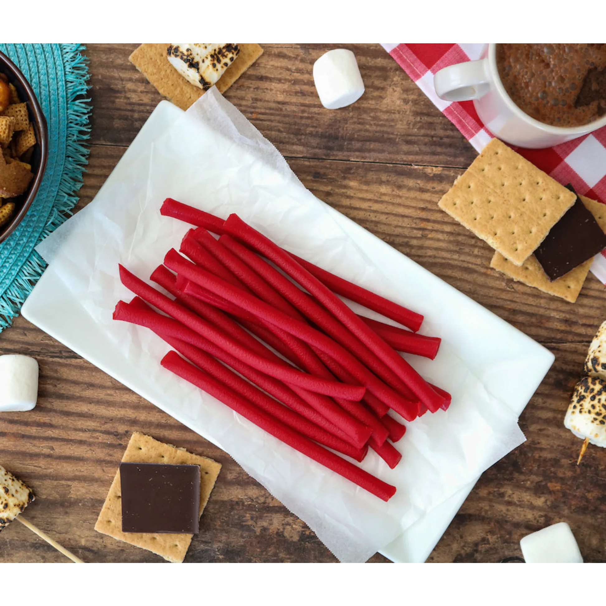 Red Vines Red Ropes Licorice Candy alongside s'mores supplies