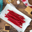 Red Vines Red Ropes Licorice Candy alongside s'mores supplies